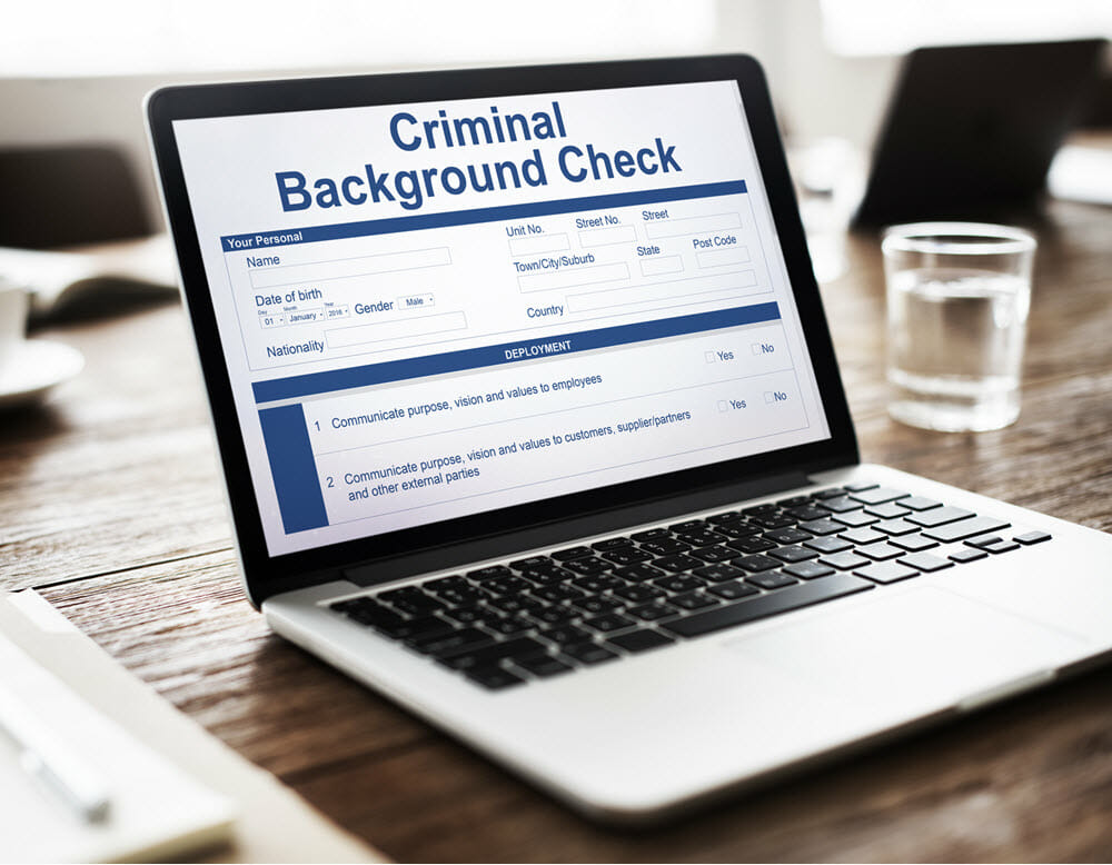 Laptop viewing criminal background check