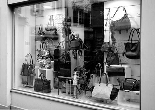 Handbags in store window