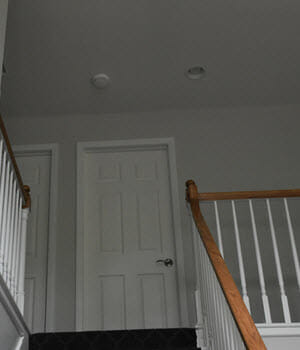 carbon monoxide detector at top of stairs