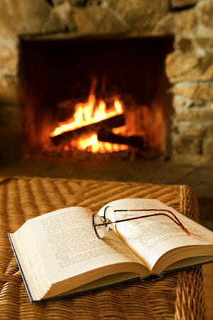 Book in front of fireplace